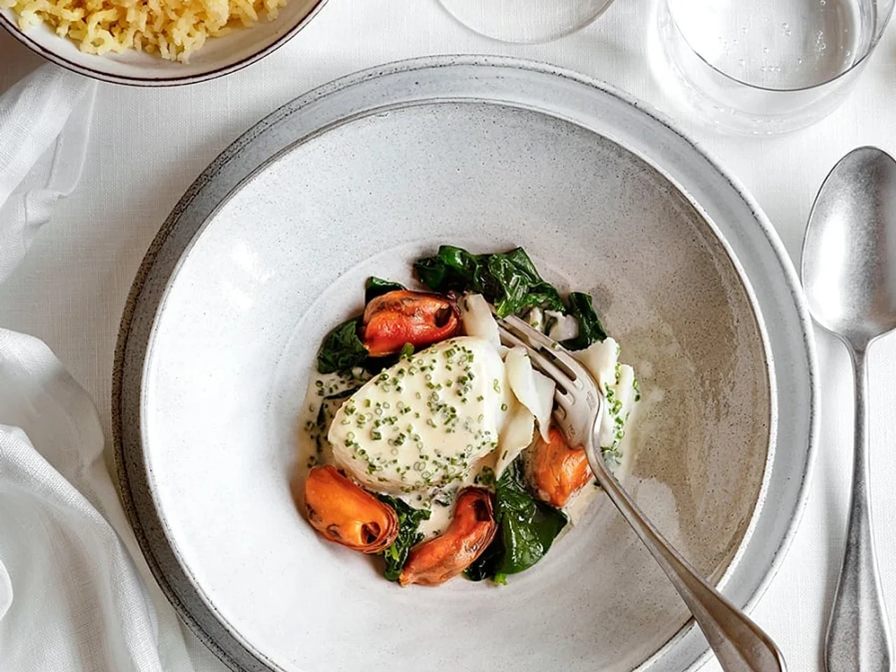 Lättrimmad torsk med blåmusslor och champagnesås